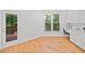 Bright kitchen area with deck access and a dedicated workspace at 1575 Wynridge Pointe, Alpharetta, GA 30005