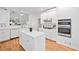 Modern kitchen with island, stainless steel appliances, and ample counter space at 1575 Wynridge Pointe, Alpharetta, GA 30005