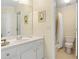 Bathroom featuring white cabinets, a bathtub and shower at 5355 Highland Pine Ln, Mableton, GA 30126