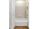 Clean, bright bathroom with a tiled shower and tub combination at 5355 Highland Pine Ln, Mableton, GA 30126