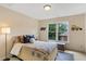 bedroom with a window overlooking the backyard at 5355 Highland Pine Ln, Mableton, GA 30126