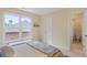 bedroom with a window overlooking the backyard and an ensuite bathroom at 5355 Highland Pine Ln, Mableton, GA 30126