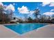 Community pool boasts a large swimming area, slide and convenient access with sleek, stainless steel rails at 5355 Highland Pine Ln, Mableton, GA 30126