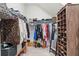 Organized walk-in closet with ample storage space and shelving at 876 Samples Nw Ln, Atlanta, GA 30318