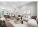 Bright living area seamlessly flowing into a modern kitchen and dining space at 1410 Cozy Court # 304, Atlanta, GA 30315