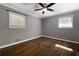 Bedroom with hardwood floors, neutral paint, a ceiling fan and natural light at 159 Lloyd Dr, Marietta, GA 30066