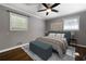 Cozy bedroom with a neutral color scheme and plenty of natural light from two windows at 159 Lloyd Dr, Marietta, GA 30066