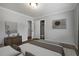 Neutral bedroom featuring hardwood floors and convenient closet access at 159 Lloyd Dr, Marietta, GA 30066