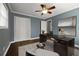 Well-lit home office with modern furnishings, ceiling fan, and stylish decor at 159 Lloyd Dr, Marietta, GA 30066