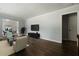 Cozy living room featuring hardwood floors, modern decor, and an open floor plan at 159 Lloyd Dr, Marietta, GA 30066