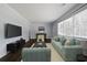 Inviting living room with ample natural light and hardwood floors at 159 Lloyd Dr, Marietta, GA 30066