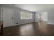 Bright living room showcasing hardwood floors, neutral paint, and a large window at 159 Lloyd Dr, Marietta, GA 30066