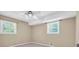 Simple and comfortable bedroom offering natural light and neutral tones at 1445 Woodhill Dr, Marietta, GA 30066