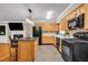 Modern kitchen featuring stainless steel appliances, a functional island and ample counter space at 1445 Woodhill Dr, Marietta, GA 30066