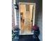 Bright entryway showcasing stairs with wood floors and a view into the home at 1910 Glynmoore Dr, Lawrenceville, GA 30043