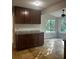 Beautiful kitchen area featuring tile floors and a view to the breakfast nook at 1910 Glynmoore Dr, Lawrenceville, GA 30043