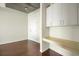 Bright bedroom featuring hardwood floors and built in desk and cabinets at 361 17Th St # 910, Atlanta, GA 30363