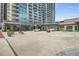 Exterior elevation shows covered parking and drop off area near retail spaces at 361 17Th St # 910, Atlanta, GA 30363