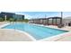 Resort-style pool with comfortable lounge seating and shaded cabanas, perfect for relaxation and entertainment at 361 17Th St # 910, Atlanta, GA 30363