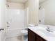 Bathroom featuring a shower-tub combo, toilet, and vanity with sink at 4628 Mcever View Dr, Sugar Hill, GA 30518