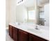 Bathroom with double sink vanity, large mirror, and separate tub and shower at 4628 Mcever View Dr, Sugar Hill, GA 30518