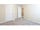 This bedroom includes a closet and access to an adjacent space at 4628 Mcever View Dr, Sugar Hill, GA 30518