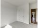 Cozy bedroom with neutral carpet, closet and an open doorway at 130 W Main Street # 1, Buford, GA 30518