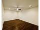 Spacious living room featuring hardwood floors and neutral walls, perfect for relaxing at 130 W Main Street # 1, Buford, GA 30518