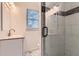 Updated bathroom featuring modern vanity and glass shower door at 512 Allendale Dr, Decatur, GA 30032