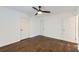 Neutral bedroom with hardwood floors, a ceiling fan, and ample closet space at 512 Allendale Dr, Decatur, GA 30032