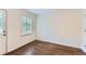 Bright room with hardwood floors, window, and door with exterior access at 512 Allendale Dr, Decatur, GA 30032