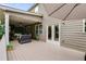 Inviting back deck offers outdoor living with seating, dining area, and a private view of the surrounding landscape at 5473 Heatherbrooke Nw Dr, Acworth, GA 30101