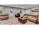 Finished basement showcasing a sitting area and bar area with a door leading outside at 5473 Heatherbrooke Nw Dr, Acworth, GA 30101