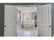 Bathroom featuring a soaking tub and tiled floor at 5473 Heatherbrooke Nw Dr, Acworth, GA 30101