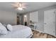 Serene bedroom with neutral colors, ceiling fan, and wood flooring at 5473 Heatherbrooke Nw Dr, Acworth, GA 30101