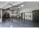 Garage with grey flooring, cabinets and stainless steel appliances at 5473 Heatherbrooke Nw Dr, Acworth, GA 30101