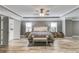 Main bedroom with tray ceiling, wood-look floors and double windows at 5473 Heatherbrooke Nw Dr, Acworth, GA 30101