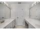 Spacious bathroom with double vanity, neutral tones and plenty of light at 6070 Lively Ct, Cumming, GA 30040