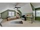 Versatile bonus room featuring a bed, vaulted ceilings and ample storage space at 939 Flowers Xing, Lawrenceville, GA 30044