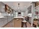 This home features an open kitchen and living space with modern decor at 939 Flowers Xing, Lawrenceville, GA 30044