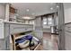 Gray kitchen with a large kitchen island and modern stainless-steel appliances at 939 Flowers Xing, Lawrenceville, GA 30044