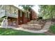 Spacious brick home with walk-out basement, patio, screened porch and backyard with landscaped stairs at 127 Grandmar Chase, Canton, GA 30115