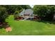 Beautifully landscaped backyard featuring lush greenery and a spacious layout for outdoor activities at 127 Grandmar Chase, Canton, GA 30115