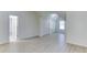 Spacious bedroom with light wood flooring, dual closets, and natural light from the window at 127 Grandmar Chase, Canton, GA 30115