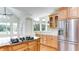 Well-equipped kitchen with stainless steel appliances, granite counters, and lots of cabinet space at 127 Grandmar Chase, Canton, GA 30115
