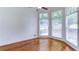 Bright and sunny room with hardwood floors and lots of natural light through the large windows at 127 Grandmar Chase, Canton, GA 30115