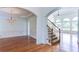 Bright living room featuring hardwood floors, a staircase and an open floor plan with lots of light at 127 Grandmar Chase, Canton, GA 30115