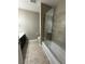 Updated bathroom with a glass shower door and shower head offers a contemporary spa experience at 1955 Nocturne Dr # 3105, Alpharetta, GA 30009