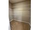 Walk-in closet with wire shelving for organized storage at 1955 Nocturne Dr # 3105, Alpharetta, GA 30009