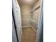 Walk-in closet with white shelving and carpeted floor is ready to store all your belongings at 1955 Nocturne Dr # 3105, Alpharetta, GA 30009